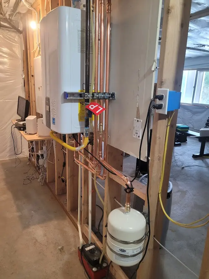 Licensed plumber repairing a kitchen sink in Sunset Hills